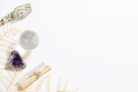 Palo Santo sticks, dried sage, crystals and fortune telling ball. magic rock for ritual, witchcraft, spiritual practice, meditation. copy spaceの写真素材
