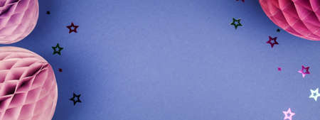 Purple Scandinavian modern paper honeycomb decoration on blue background.Concept of happiness, joy,...