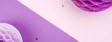 Purple Scandinavian modern paper honeycomb decoration on purple background.Concept of happiness, joy, birthday, party, advertisement,copy space bannerの写真素材