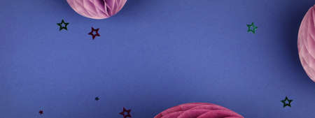 Purple Scandinavian modern paper honeycomb decoration on blue background.Concept of happiness, joy,...