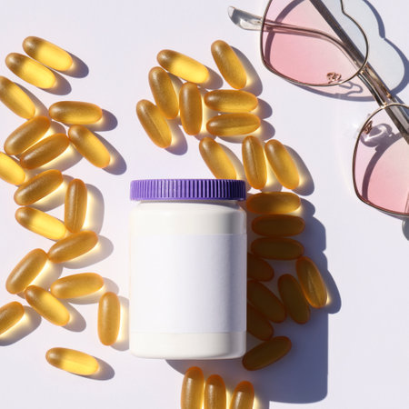 white plastic bottle with pills and sunglasses on white background. template, mock up concept....