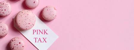 pink tax concept. big pink dessert and small desserts on pink background. comparison style. copy space bannerの写真素材
