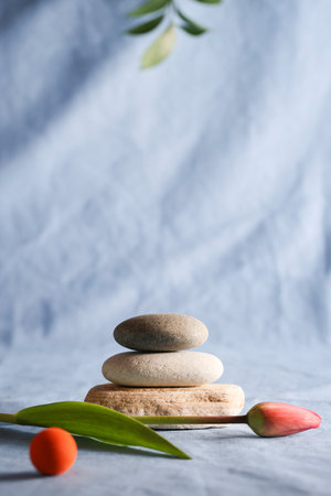 Minimal background for branding and product presentation.natural stone for product display on blue...
