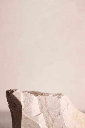 Minimal background for branding and product presentation.natural stone for product display on grey background.copy space.advertising and sale conceptの写真素材
