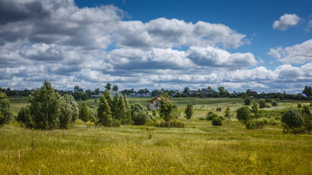Rural landscape on sunny day with blue sky and clouds background, Nature.の写真素材