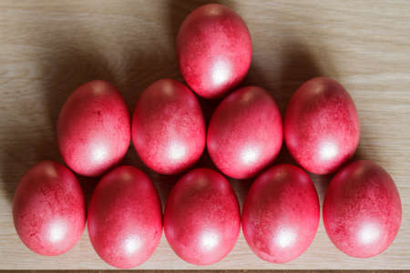 Easter scene, painted eggs in a box, indoors, top viewの写真素材
