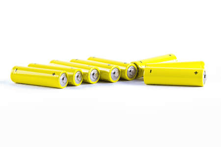 Few yellow power batteries on whiteの写真素材