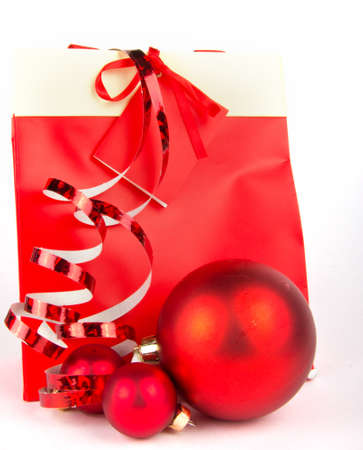 Christmas present in red on whiteの写真素材