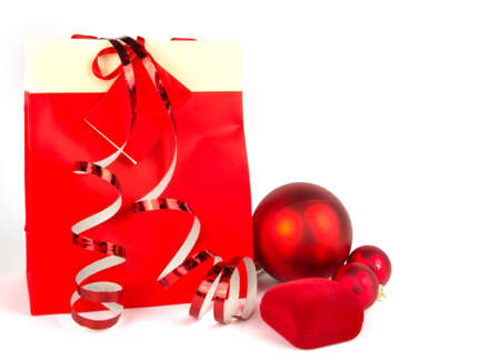 Christmas presents in red on whiteの写真素材
