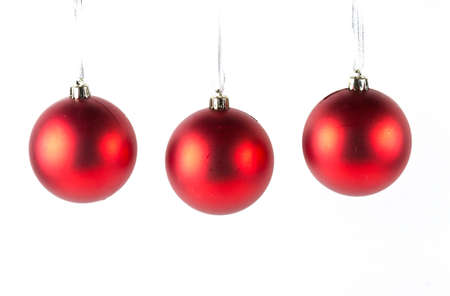 Red christmas balls isolated on whiteの写真素材