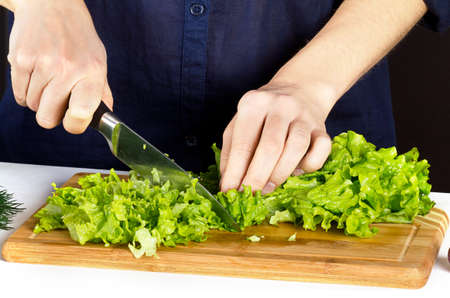 woman cooking saladの写真素材