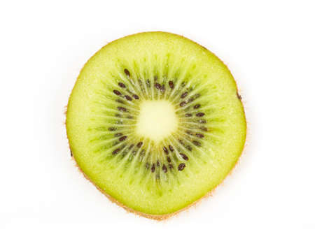 Kiwi fruit slice on white backgroundの写真素材