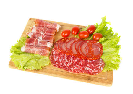 Sliced meat snack with some saladの写真素材