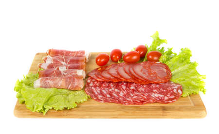 Sliced meat snack with some saladの写真素材