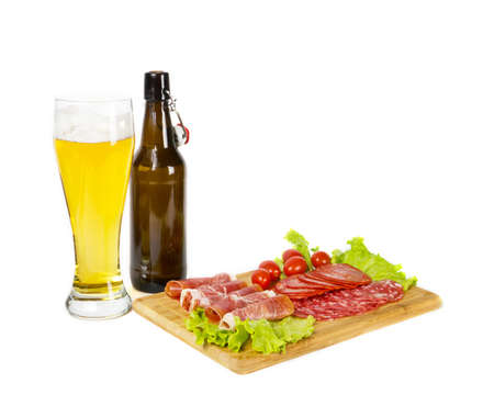 Lager beer with some snack on white backgroundの写真素材