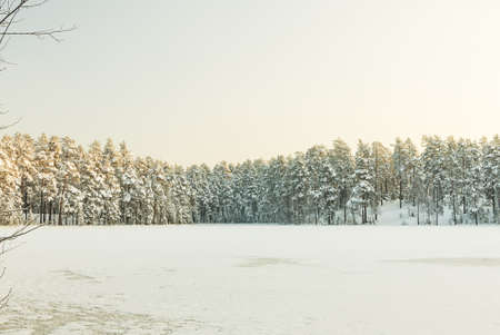 Russian winter lake in ice and snowの写真素材