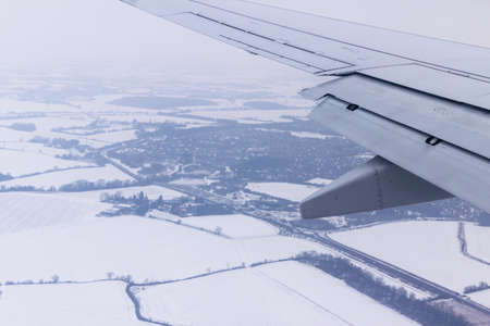 View from airplane window with wingの写真素材