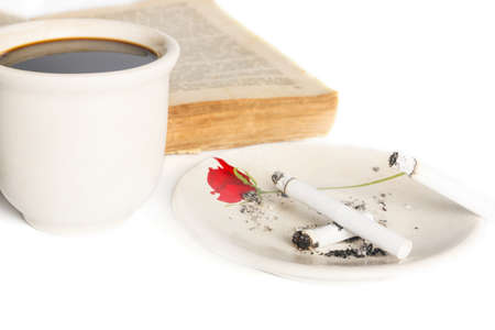 Coffee with book and cigarettsの写真素材