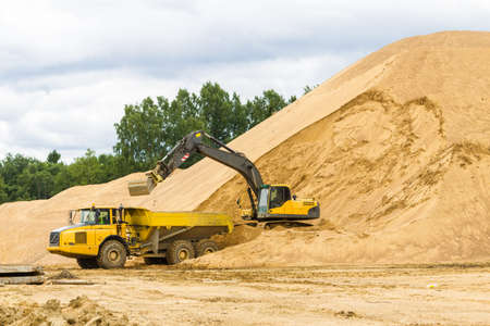 Yellow Construction Excavator at Work