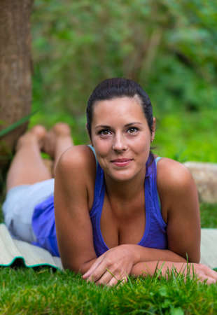 Beautiful young brunet woman outdoorsの写真素材