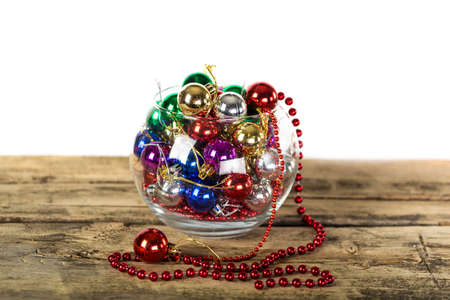 Colorful Christmas balls on wooden backgroundの写真素材
