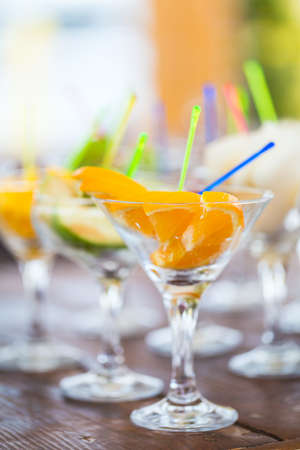 Fresh Fruit cuts in a glass close up の写真素材