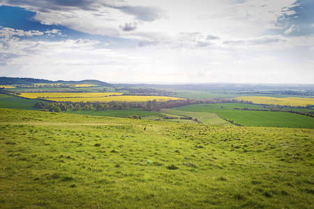 Perfect sunny summer landscape of hills and skyの写真素材