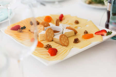 Perfect party cheese board on a tableの写真素材