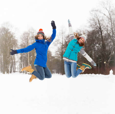 Winter women have fun outdoors