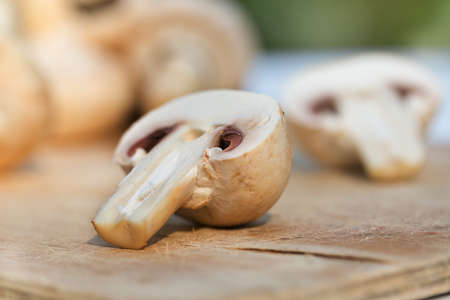 champignons portobello mushrooms on a wooden backgroundの写真素材