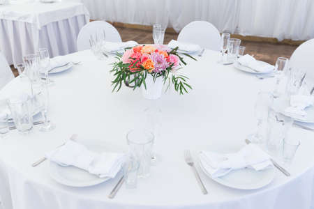 Served white wedding table layoutの写真素材