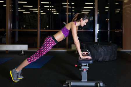 beautiful young women working out in the gymの写真素材