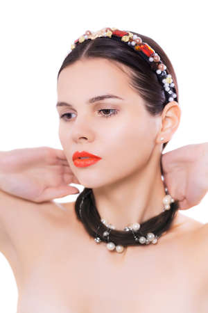 Young beauty woman face with makeup make-up on whiteの写真素材