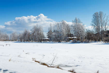 russian winter forest road in snow and iceの写真素材