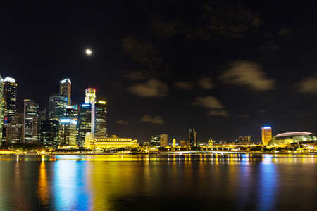 Singapore, January 14, 2016: Landscape of Marina Bay financial district and business buildings in lights at night outdoorsのeditorial素材