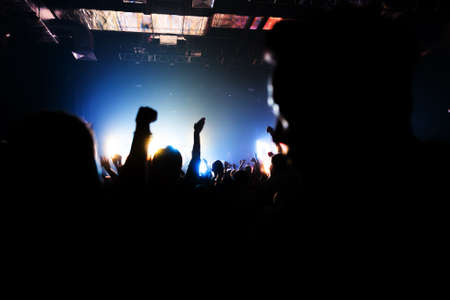 silhouettes of a crowd party concert music happyの写真素材
