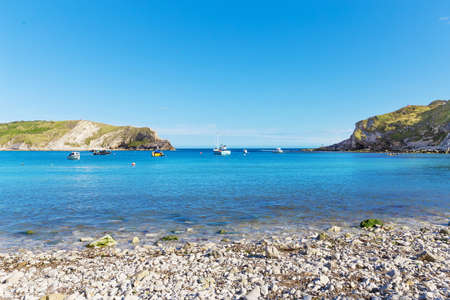 Popular Lulworth Cove Atlantic ocean coast, Dorchester, England, United Kingdomの写真素材