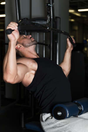 Muscle Man healthy workout exercise in a gymの写真素材