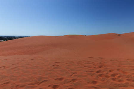 Red sand dunes in Mui Ne villiage, Vietnamの写真素材