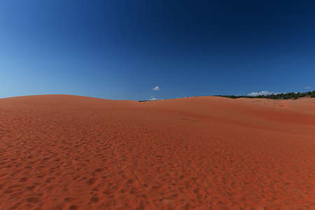 Red sand dunes in Mui Ne villiage, Vietnamの写真素材