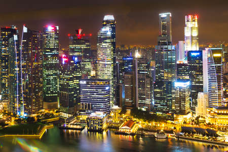 Singapore, 15 January 2016 - Landscape of the financial district and business building in evening lights from sands SkyPark observation deckのeditorial素材
