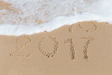 New 2016 2017 Year sign on a sea coast sandの写真素材