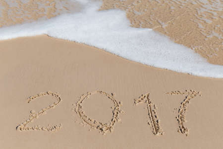 New 2016 2017 Year sign on a sea coast sandの写真素材