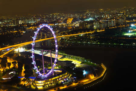 Landscape of the Singapore Marina Bay in night lights from skypark obsevation deckの写真素材