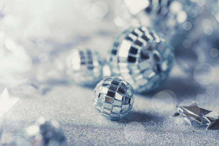 Silver Christmas composition with silver baubles sparklingの写真素材