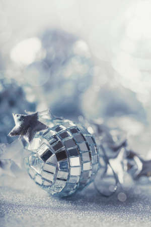 Silver Christmas composition with silver baubles sparklingの写真素材
