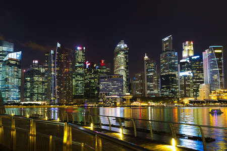 Singapore, Singapore - 15 January 2016: Landscape of Marina Bay hotel, bridge, museum and financial district at nightのeditorial素材