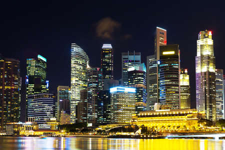 Singapore, Singapore - 15 January 2016: Landscape of Marina Bay hotel, bridge, museum and financial district at nightのeditorial素材