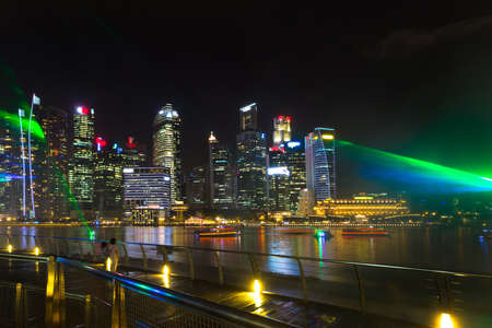 Singapore, Singapore - 15 January 2016: Landscape of Marina Bay hotel, bridge, museum and financial district at nightのeditorial素材