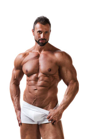 Muscular atletic man in underwear isolated on a whiteの写真素材